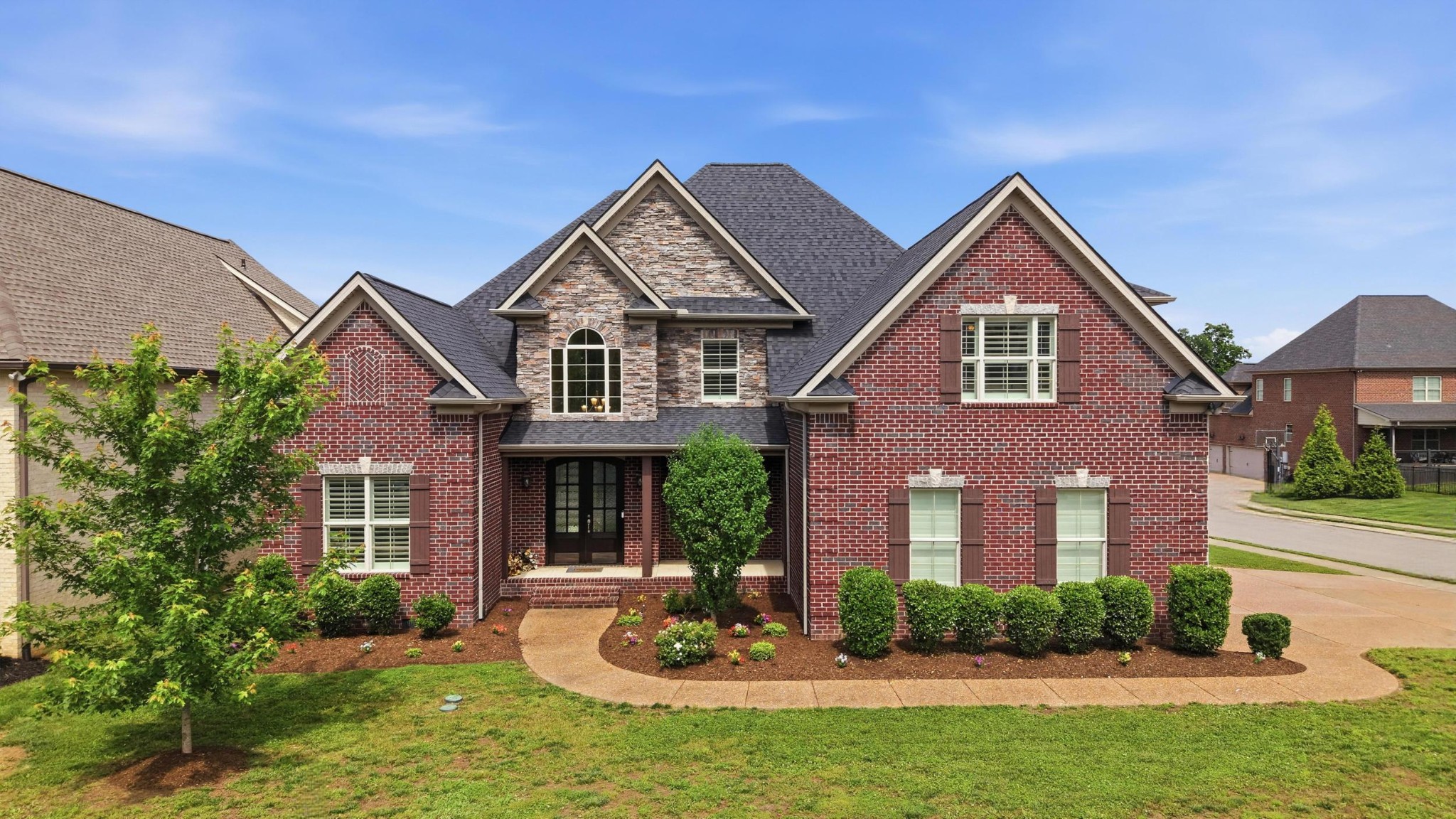 6000 Wallaby Court Spring Hill, TN 37174 - Photo 1 of 57 a front view of a house with a yard