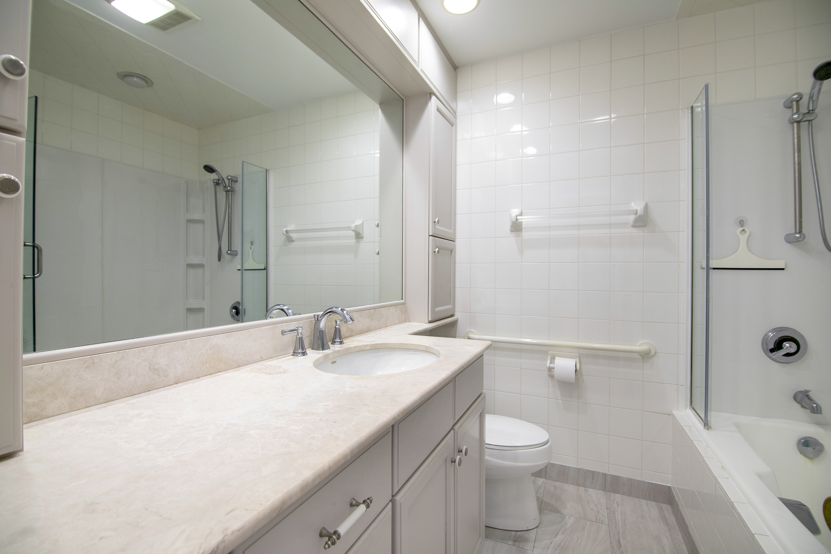1745 4100N Road Herscher, IL 60941 - Photo 13 of 31 a bathroom with a granite countertop sink a toilet and shower