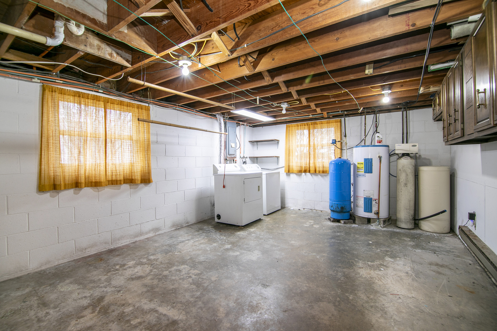 1745 4100N Road Herscher, IL 60941 - Photo 18 of 31 a view of a garage room with wooden walls