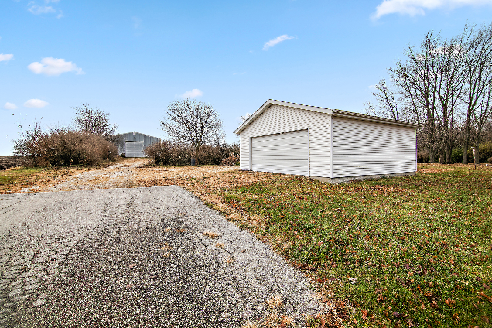1745 4100N Road Herscher, IL 60941 - Photo 23 of 31 a front view of house with yard and trees