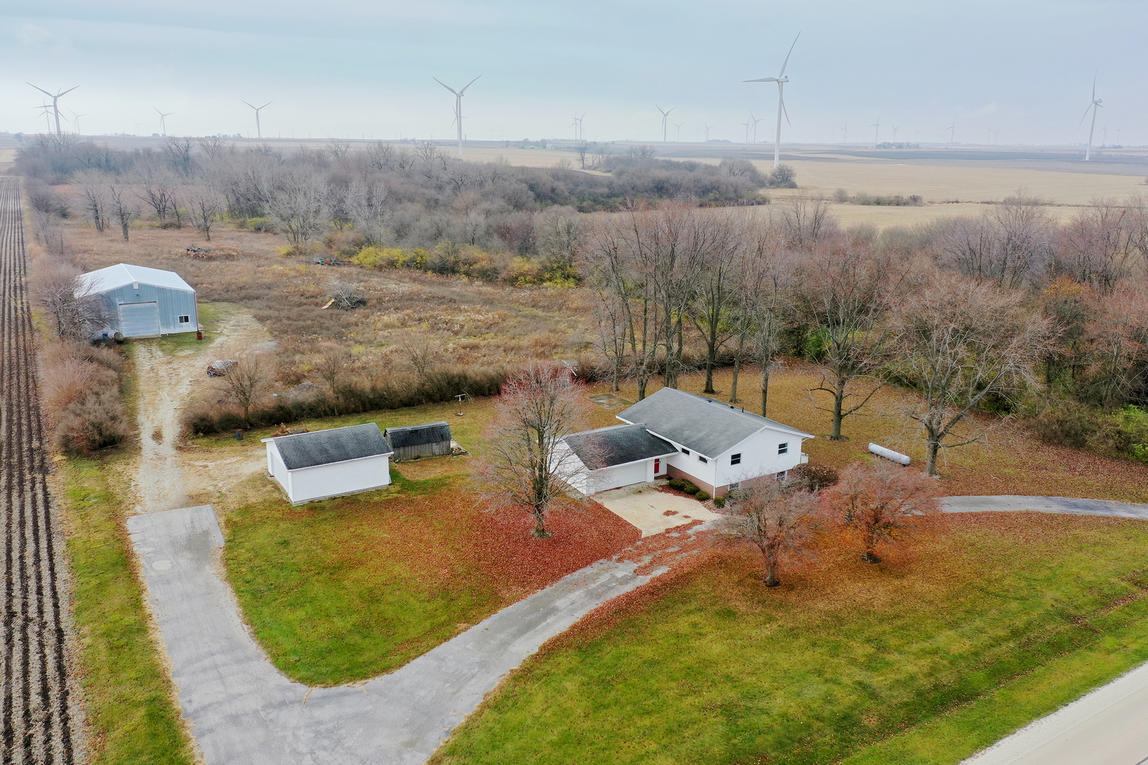 1745 4100N Road Herscher, IL 60941 - Photo 28 of 31 a backyard of a house with table and chairs