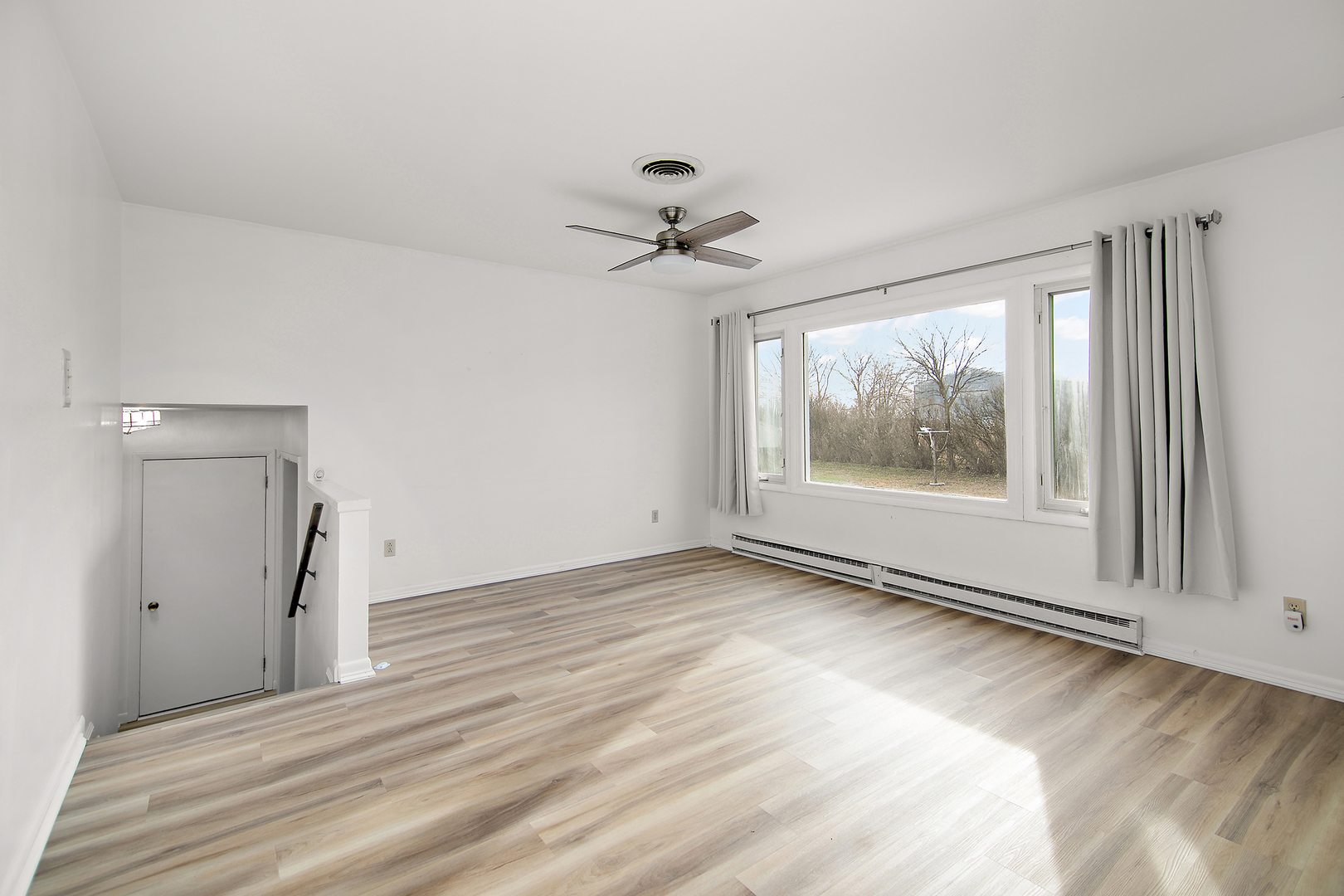 1745 4100N Road Herscher, IL 60941 - Photo 4 of 31 a view of an empty room with a window