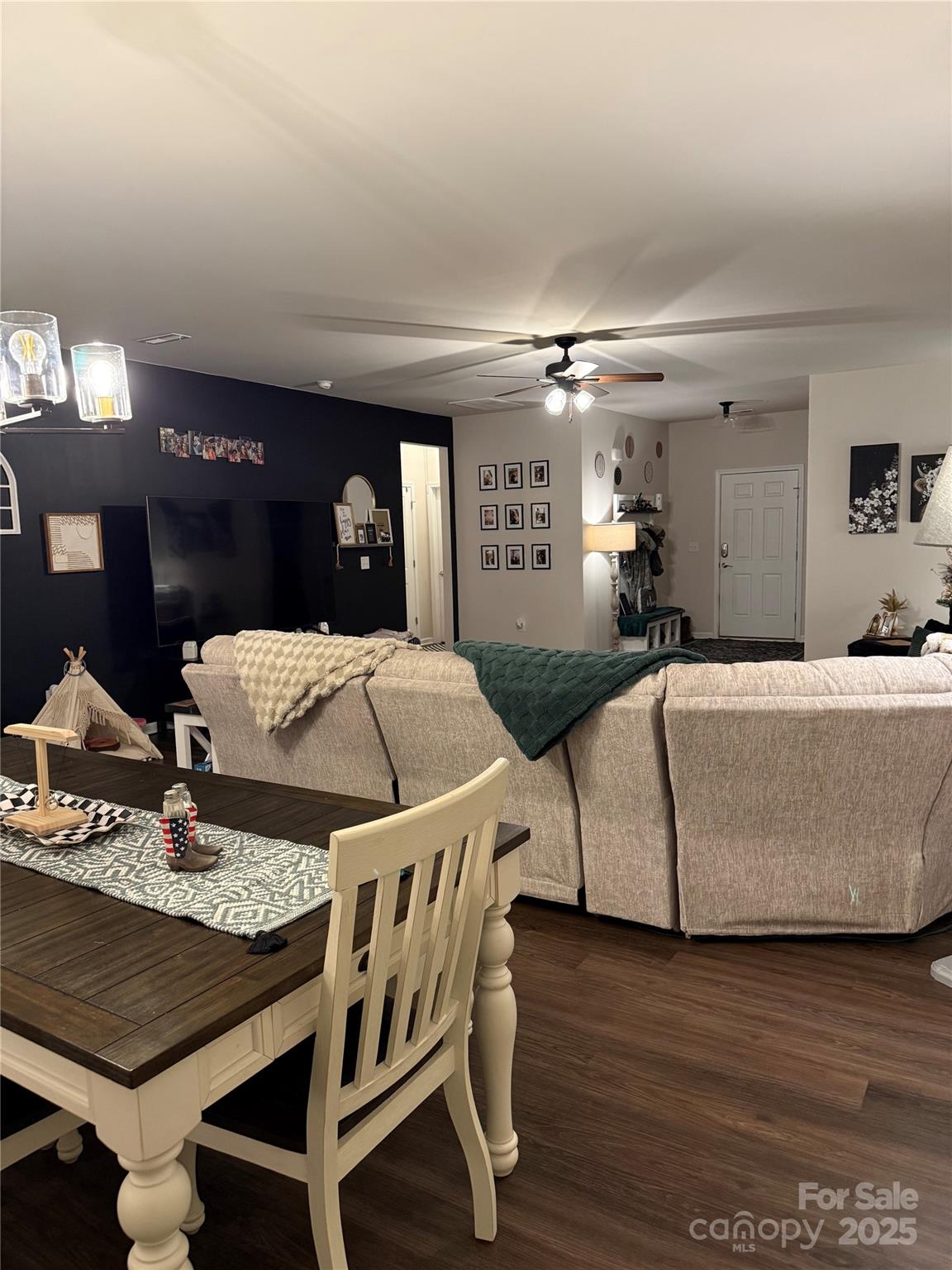 115 Stoney Lane Cherryville, NC 28021 - Photo 14 of 27 a living room with furniture and wooden floor