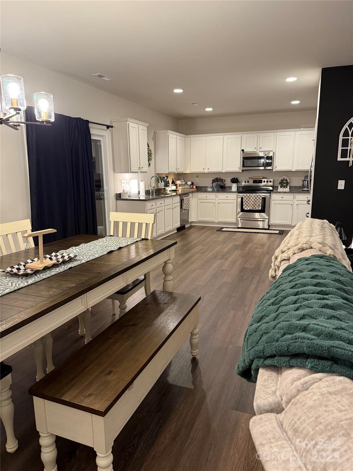 115 Stoney Lane Cherryville, NC 28021 - Photo 15 of 27 a large kitchen with stainless steel appliances lots of counter space and a sink