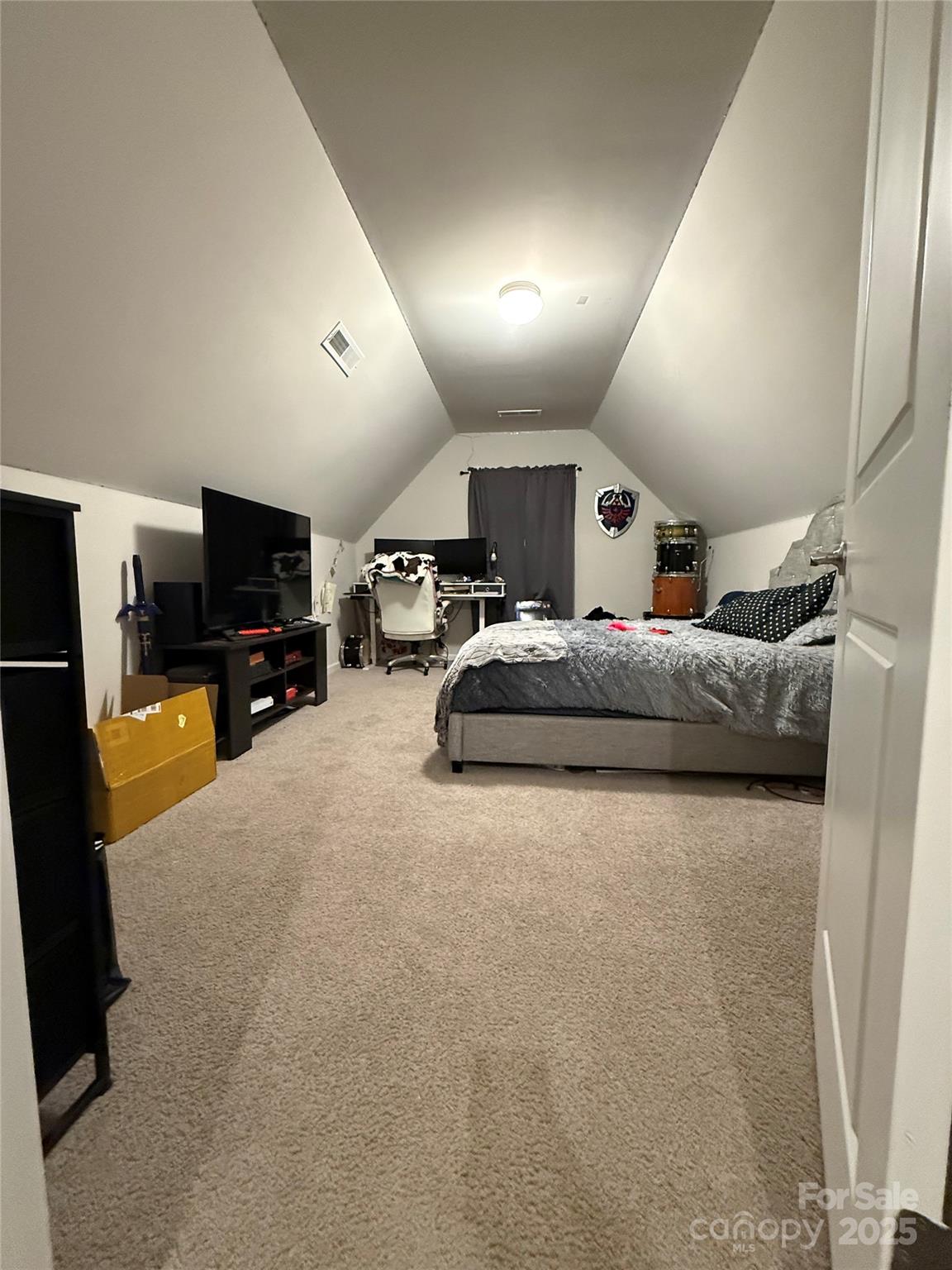 115 Stoney Lane Cherryville, NC 28021 - Photo 23 of 27 a living room with furniture flat screen tv and a refrigerator
