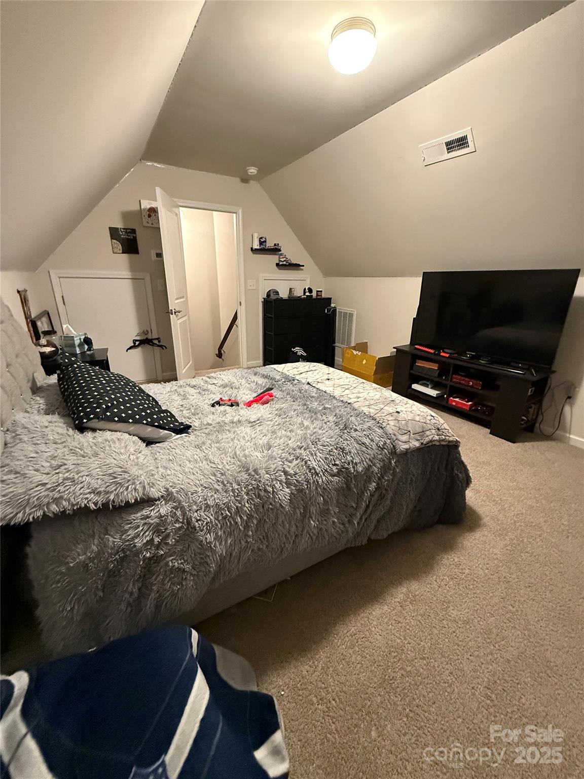 115 Stoney Lane Cherryville, NC 28021 - Photo 24 of 27 a bedroom with a bed and window