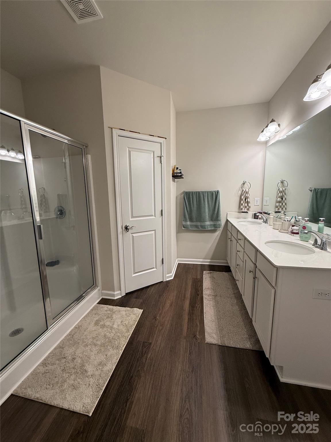 115 Stoney Lane Cherryville, NC 28021 - Photo 8 of 27 a bathroom with a sink a mirror and a shower