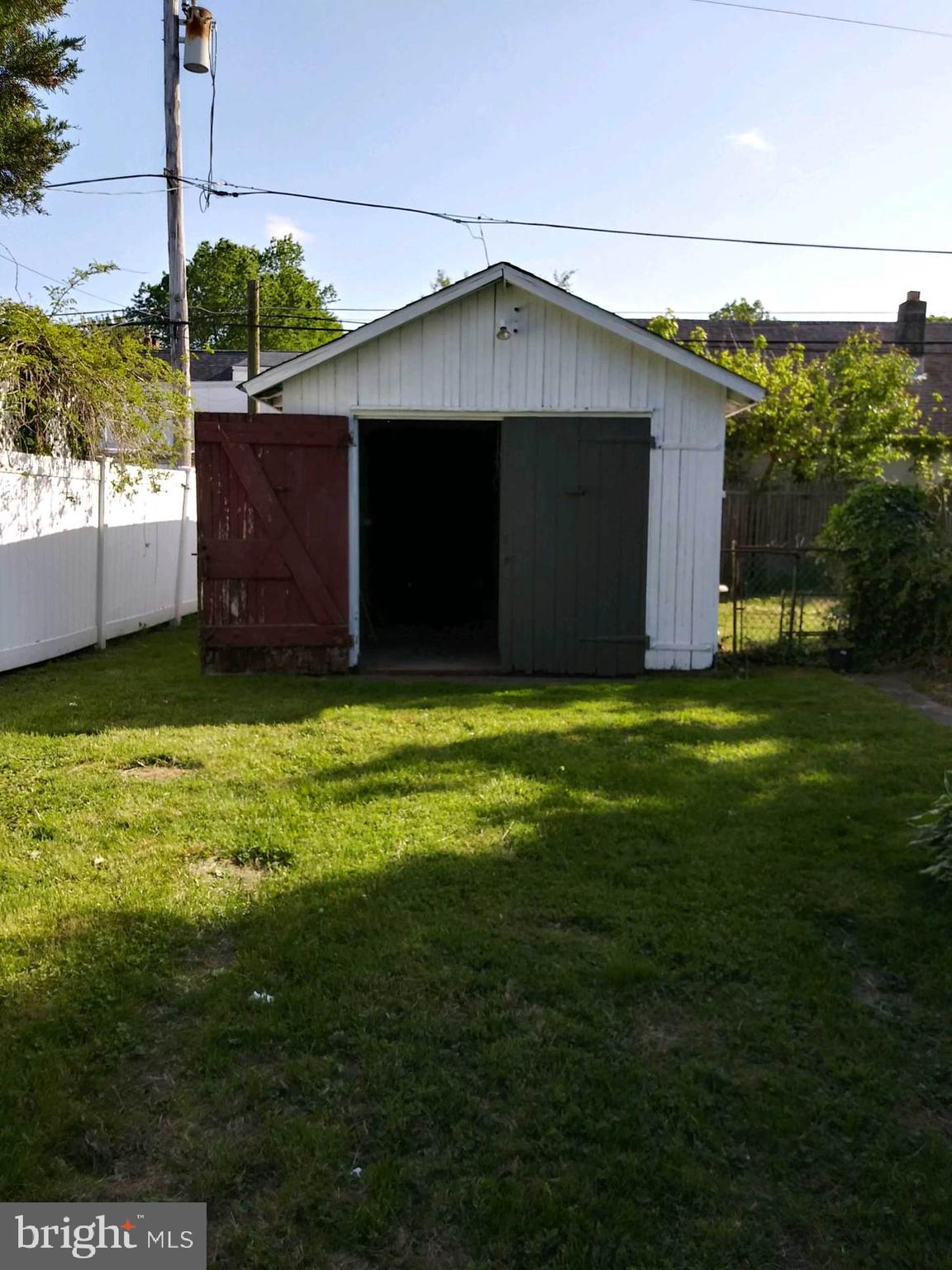 807 Merlin Street Bristol, PA 19007 - Photo 18 of 18 a view of a house with a yard