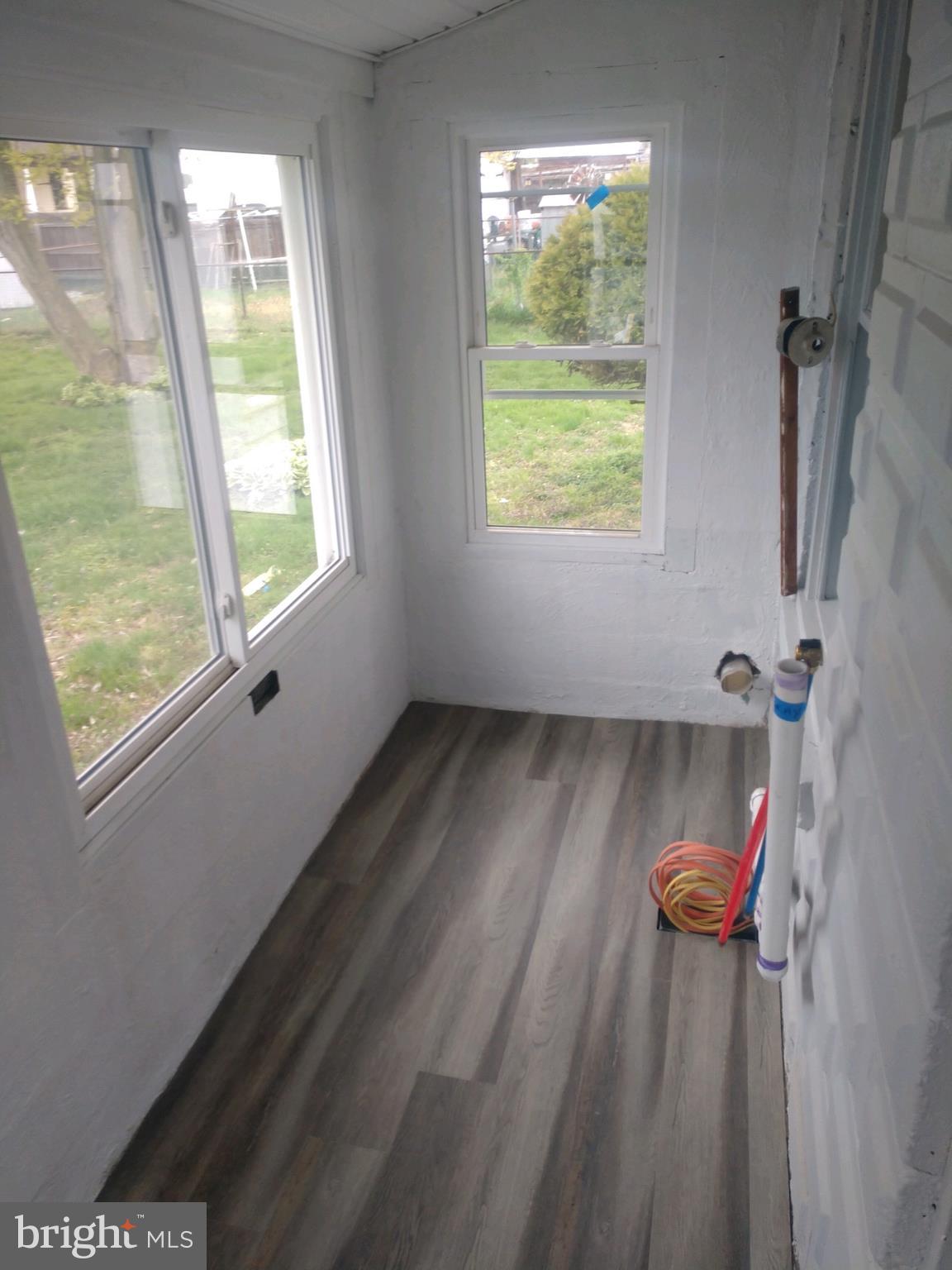 807 Merlin Street Bristol, PA 19007 - Photo 10 of 18 a view of a bathroom with a window and a shower