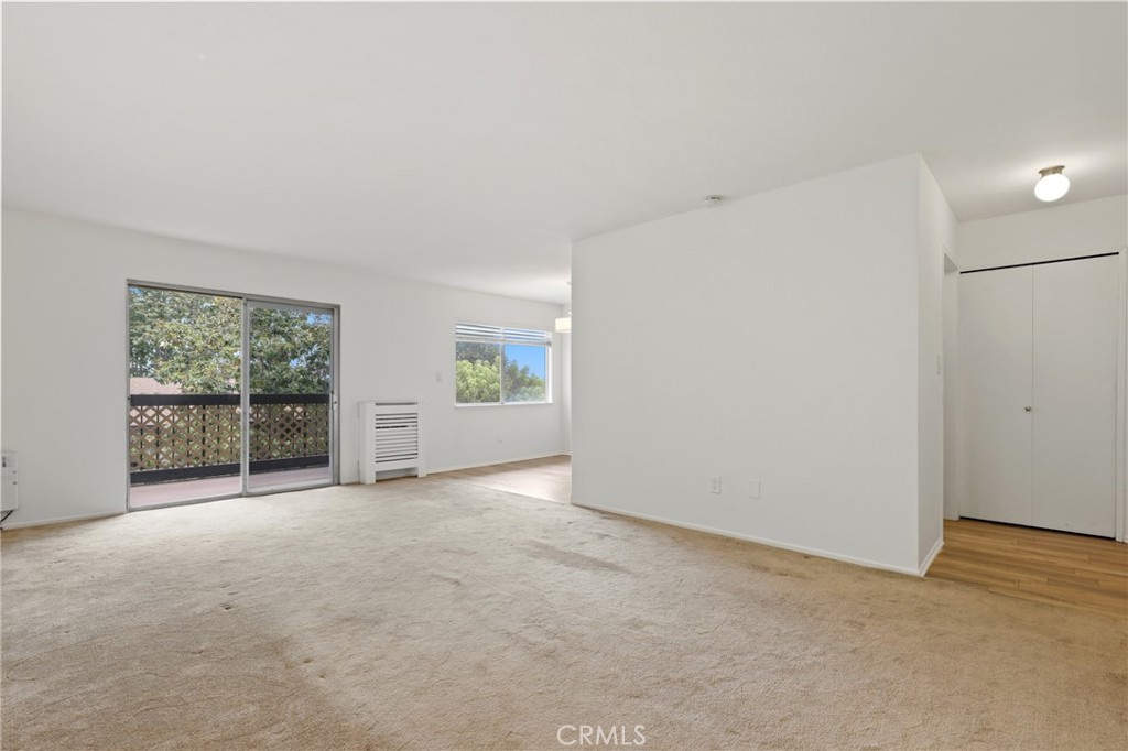 12200 Montecito Road, Unit D301 Seal Beach, CA 90740 - Photo 4 of 28 an empty room with windows
