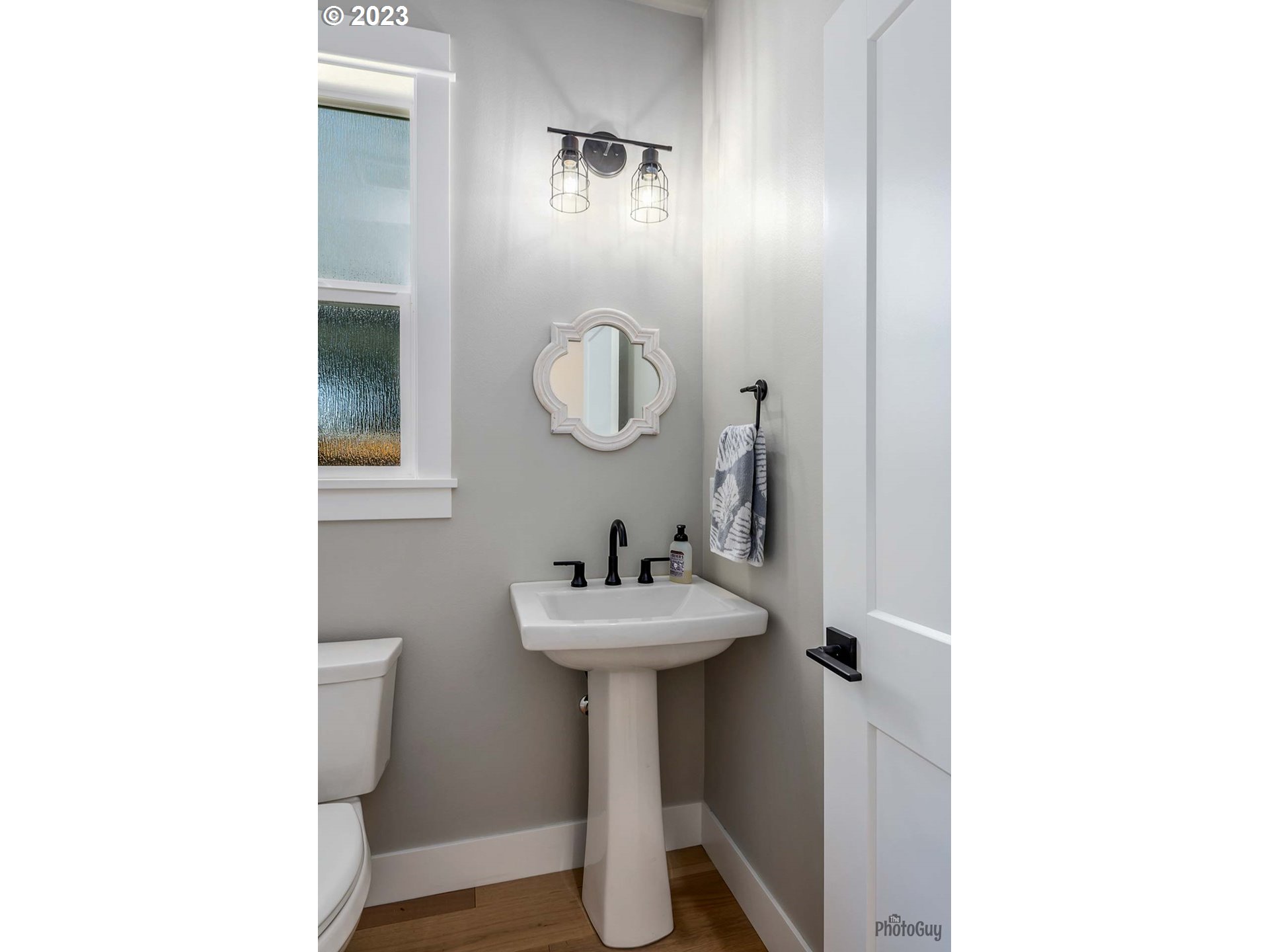 3561 Nestucca Loop Eugene, OR 97408 - Photo 20 of 29 a bathroom with a sink and a mirror