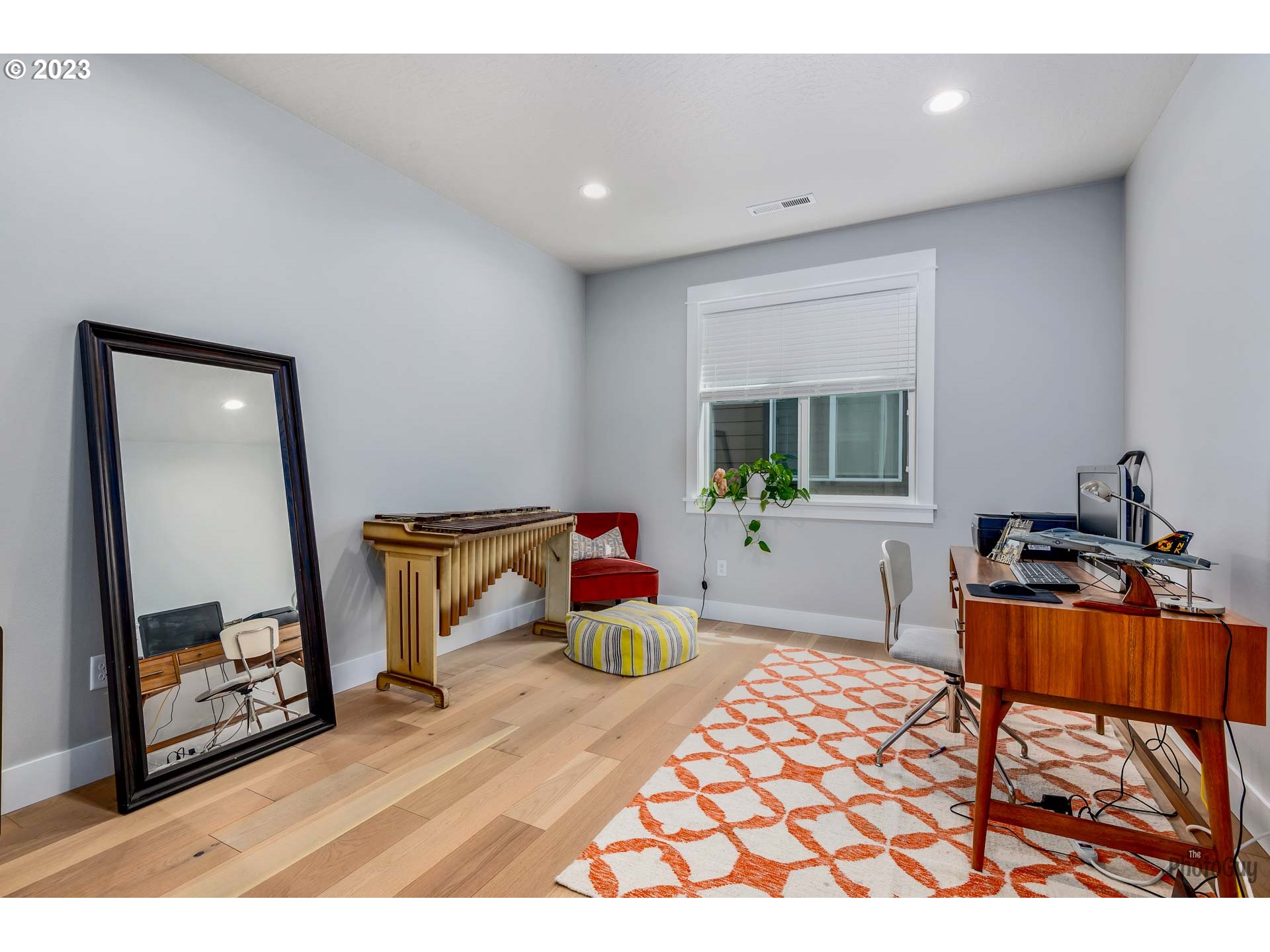 3561 Nestucca Loop Eugene, OR 97408 - Photo 22 of 29 a bedroom with furniture and a mirror