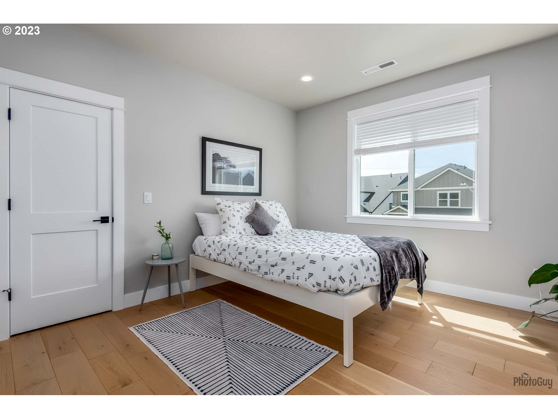 3561 Nestucca Loop Eugene, OR 97408 - Photo 23 of 29 a bedroom with a bed and a window