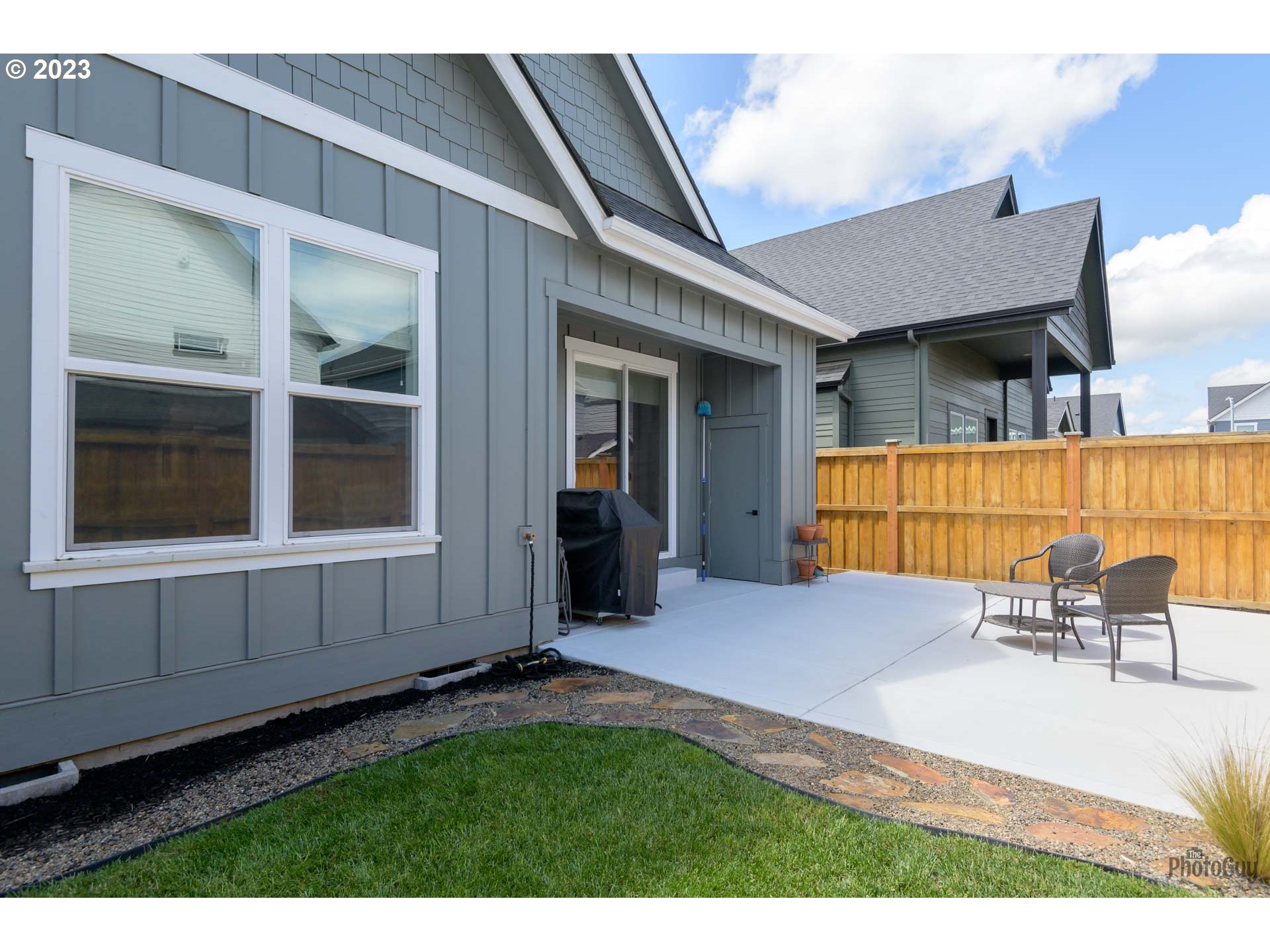 3561 Nestucca Loop Eugene, OR 97408 - Photo 28 of 29 a view of house with backyard porch and furniture