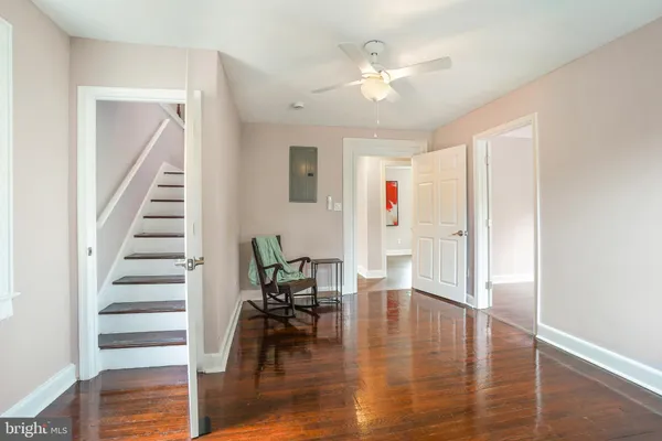 a view of dining room with furniture and wooden floor
