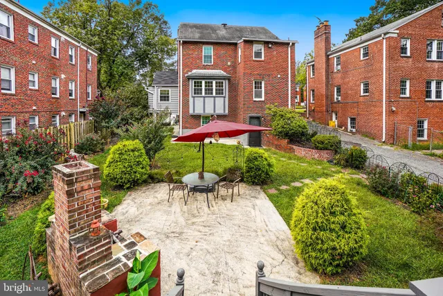 a view of a chairs and table in the patio