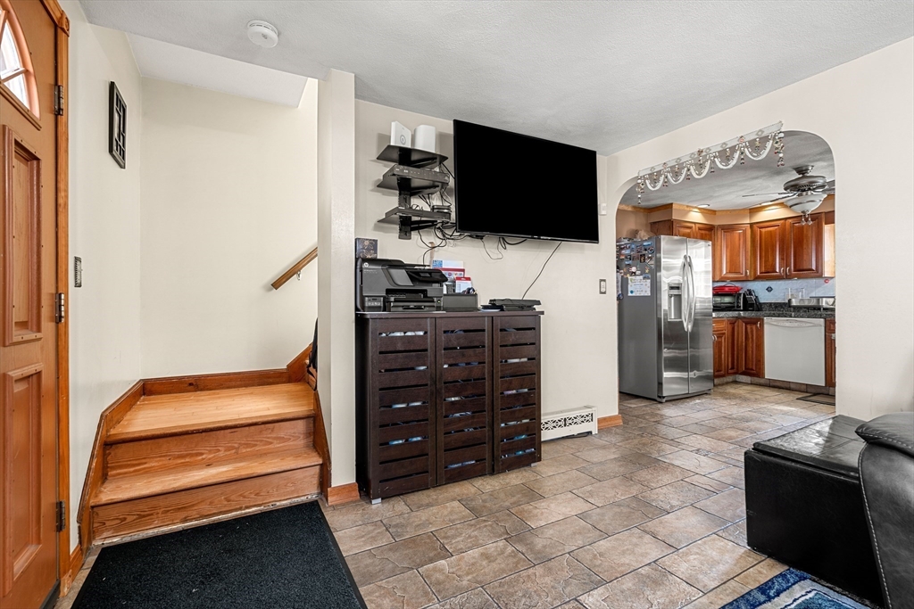 3 Stone Court Gloucester, MA 01930 - Photo 11 of 28 a room with furniture and flat screen tv