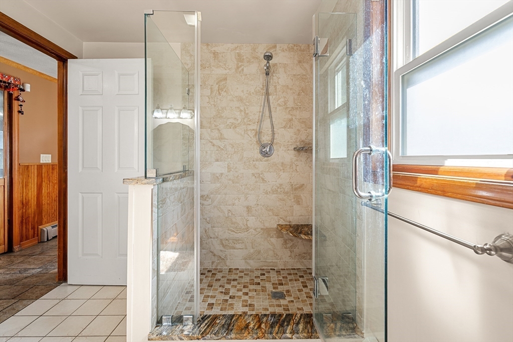 3 Stone Court Gloucester, MA 01930 - Photo 23 of 28 a bathroom with a shower and a sink