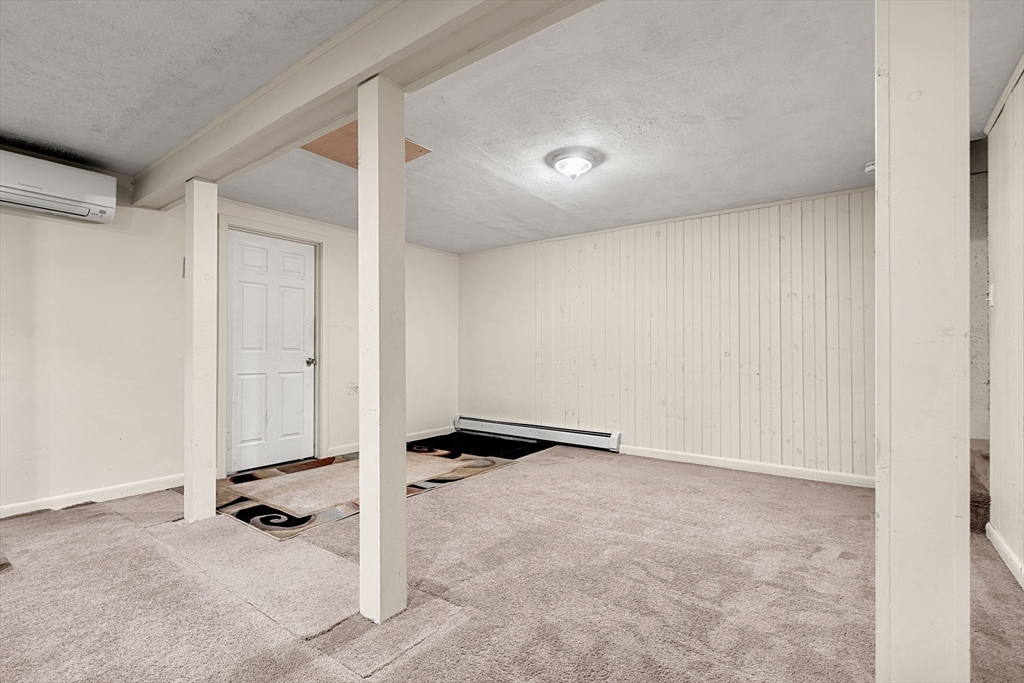 3 Stone Court Gloucester, MA 01930 - Photo 25 of 28 an empty room with a door