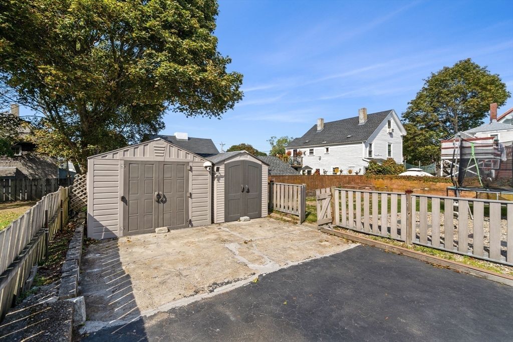 3 Stone Court Gloucester, MA 01930 - Photo 27 of 28 a front view of a house with a yard