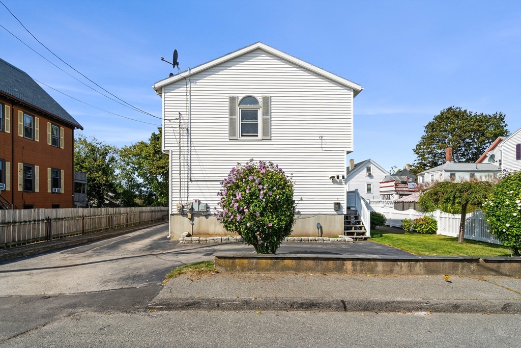 3 Stone Court Gloucester, MA 01930 - Photo 28 of 28 a view of a house with a yard and plants