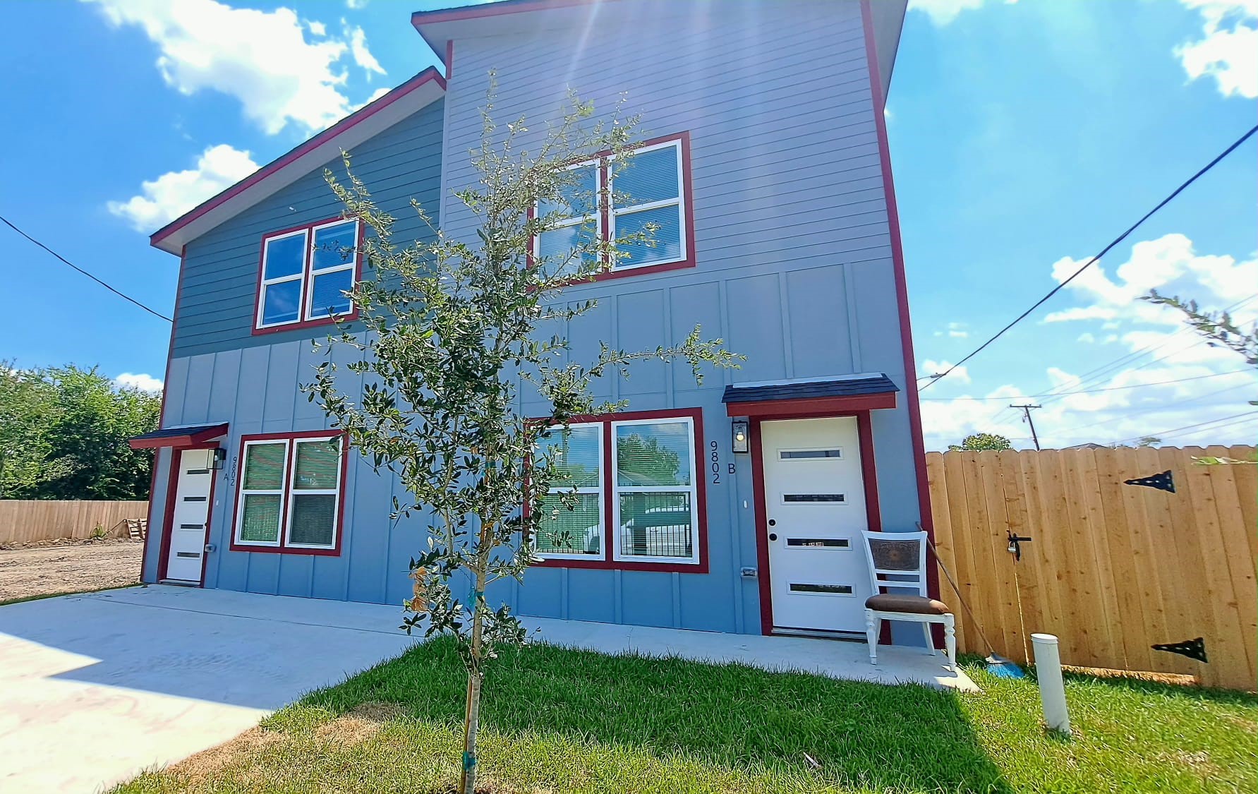 9806 Fillmore Street, Unit B Houston, TX 77029 - Photo 1 of 9 a view of a house with a yard