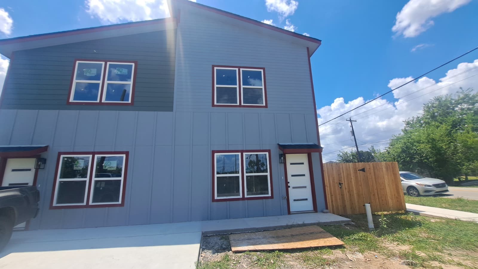 9806 Fillmore Street, Unit B Houston, TX 77029 - Photo 2 of 10 a front view of a house with a yard