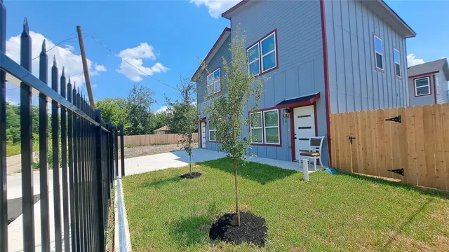 a house view with a garden space