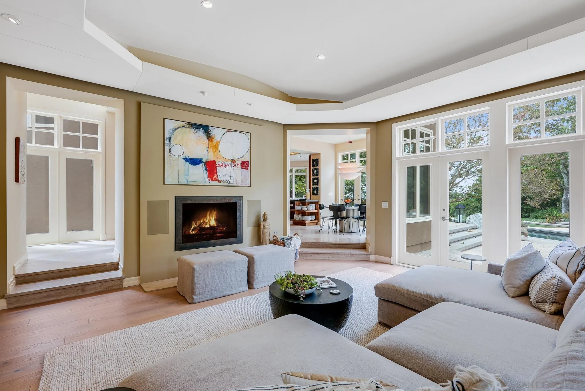 7891 Muirfield Way Rancho Santa Fe, CA 92067 - Photo 22 of 47 a living room with furniture and a fireplace