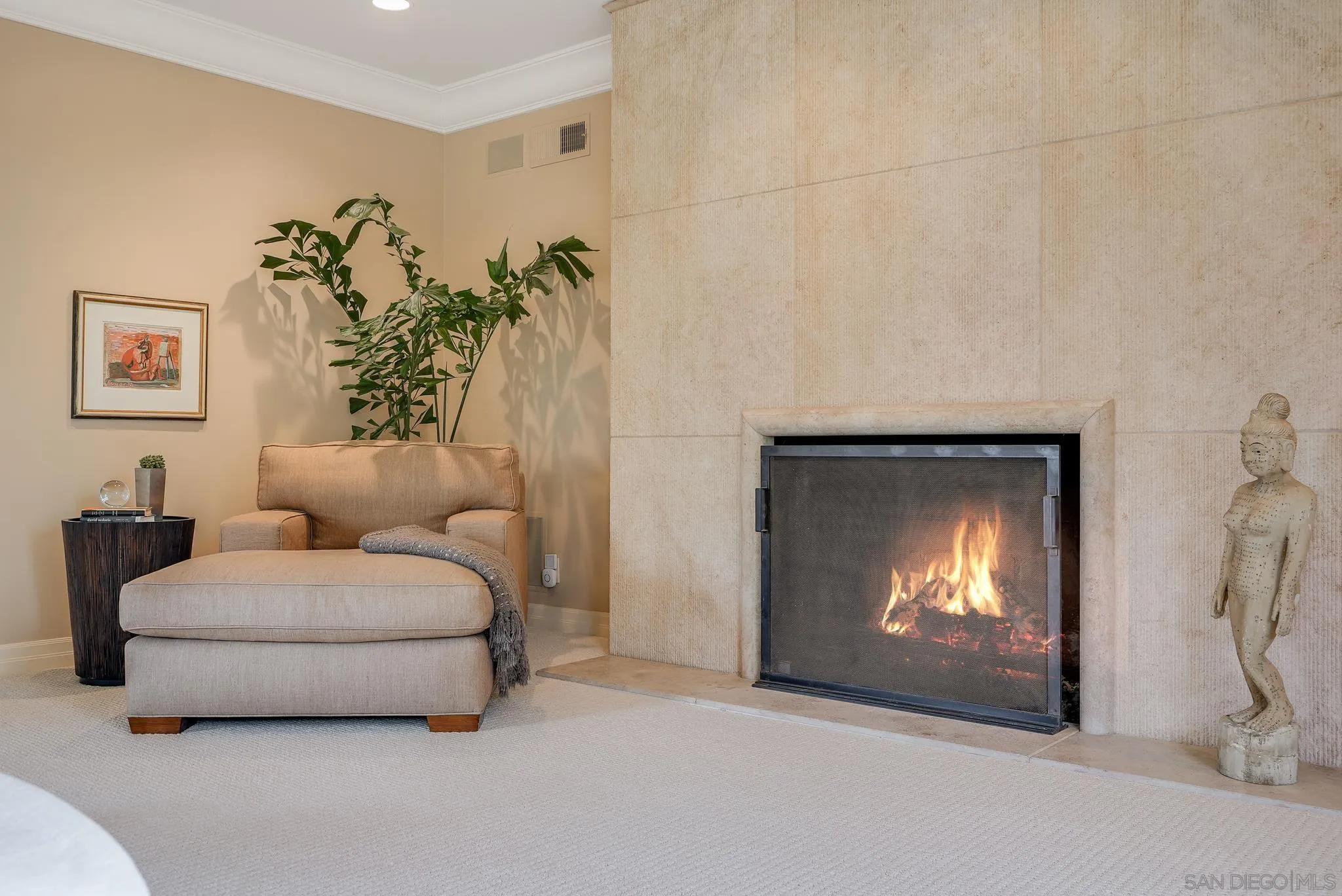 7891 Muirfield Way Rancho Santa Fe, CA 92067 - Photo 25 of 47 a living room with furniture and a fireplace