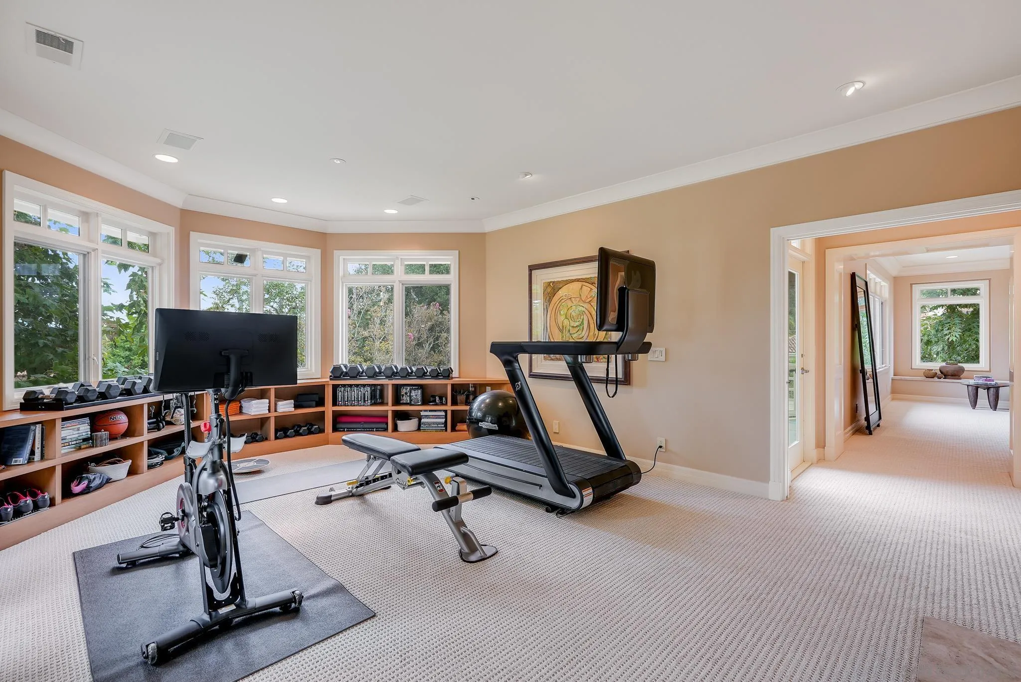 7891 Muirfield Way Rancho Santa Fe, CA 92067 - Photo 28 of 47 a view of a livingroom with workspace and windows