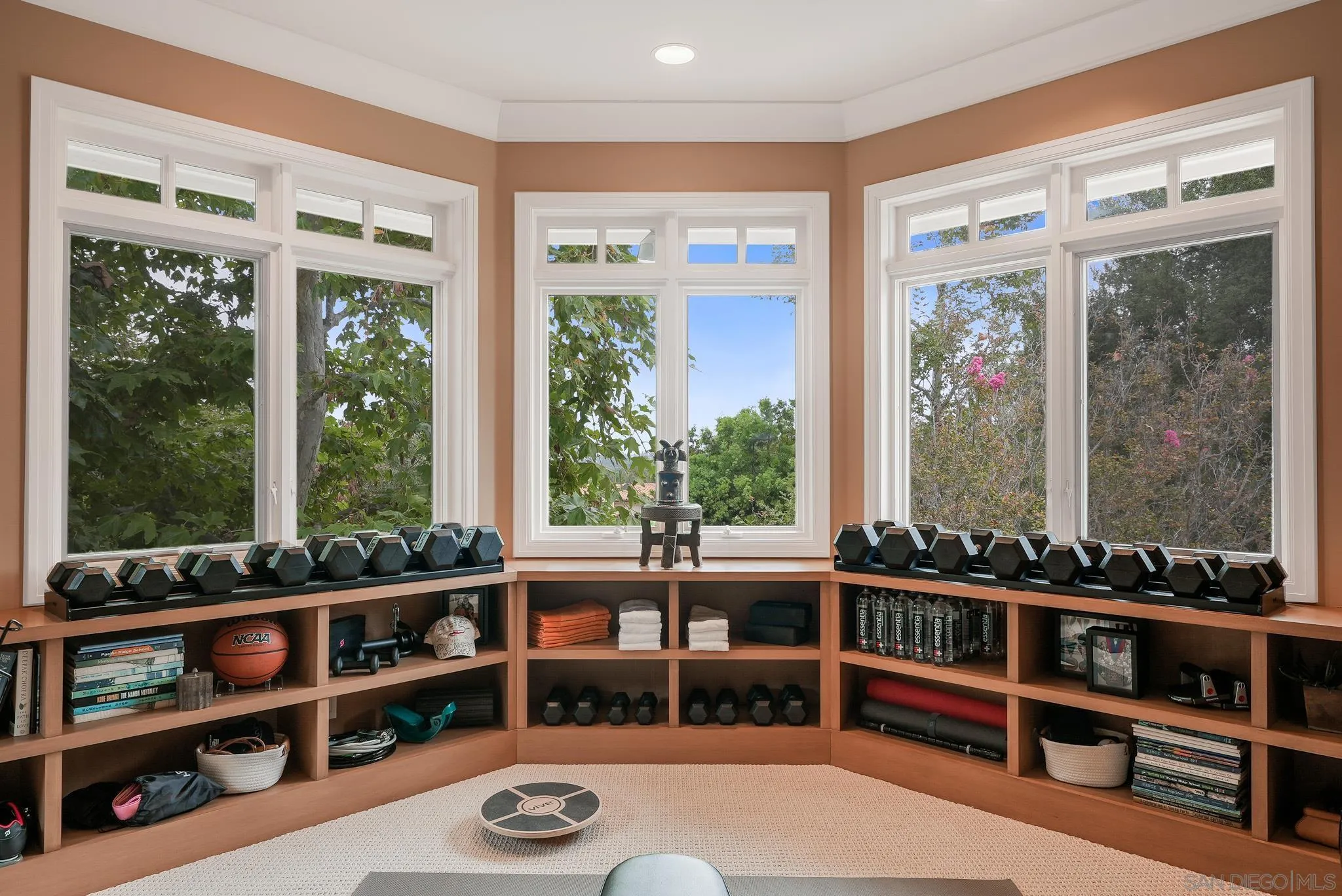7891 Muirfield Way Rancho Santa Fe, CA 92067 - Photo 29 of 47 a room with furniture and a large window