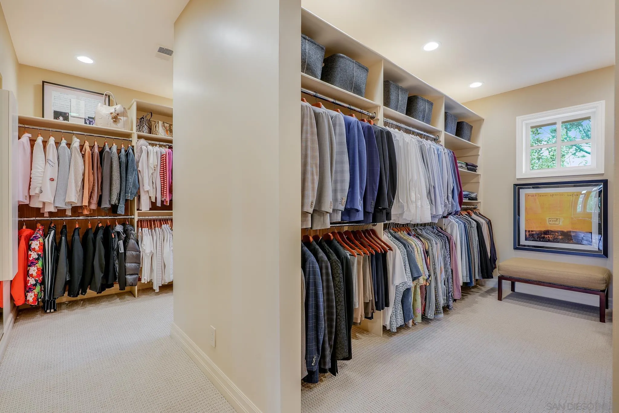 7891 Muirfield Way Rancho Santa Fe, CA 92067 - Photo 30 of 47 a view of walk in closet with clothes and shoes