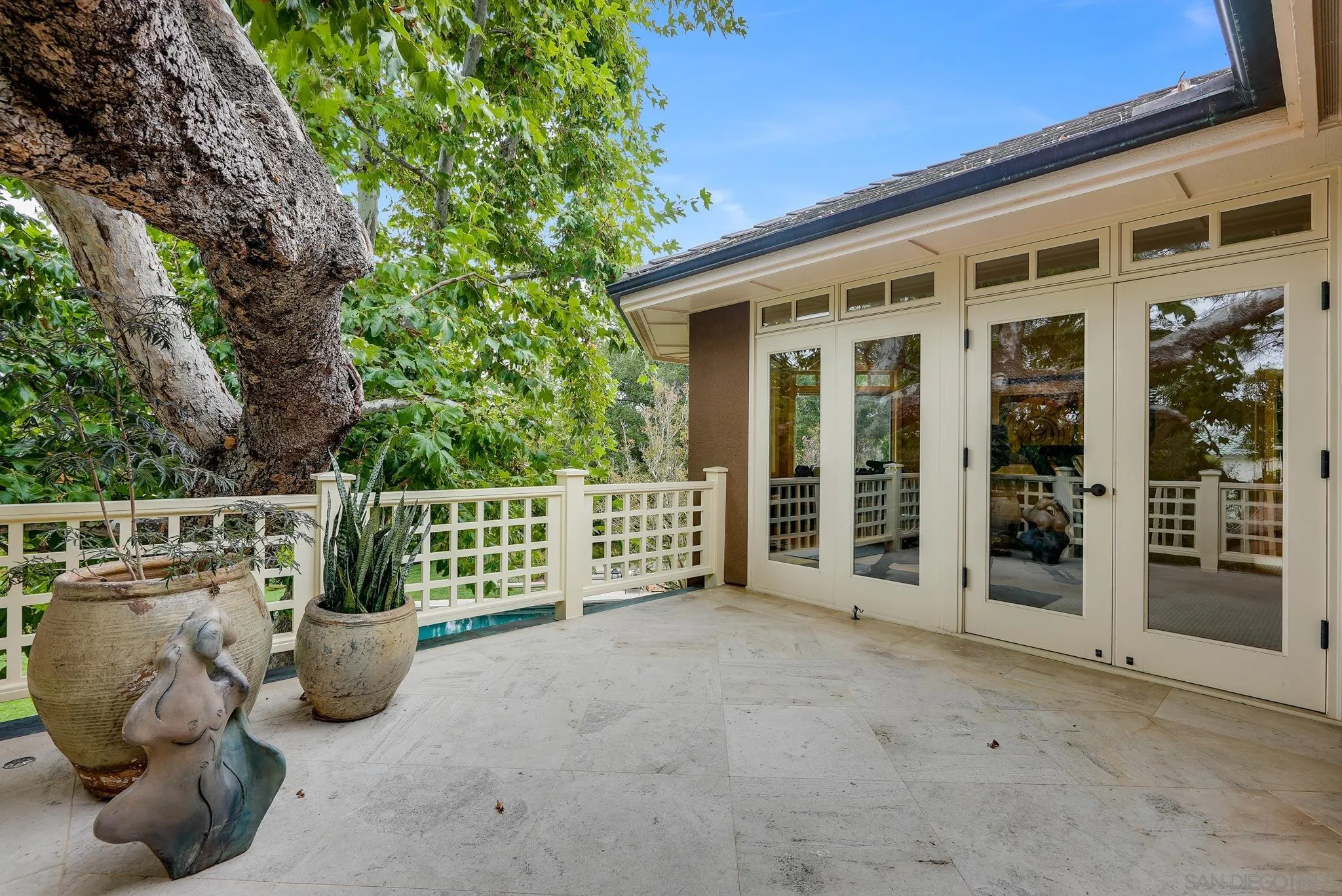 7891 Muirfield Way Rancho Santa Fe, CA 92067 - Photo 31 of 47 a view of a chair and table in the balcony