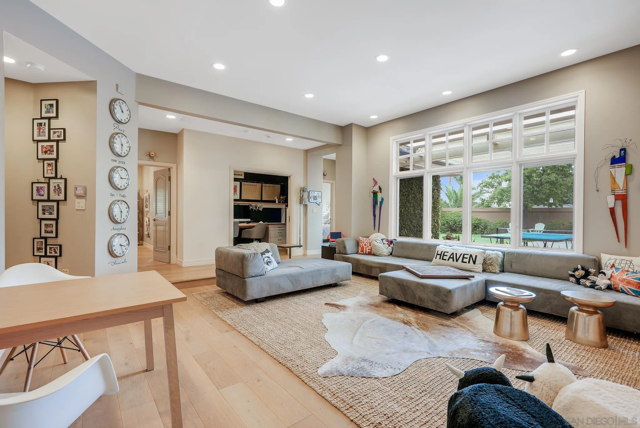 7891 Muirfield Way Rancho Santa Fe, CA 92067 - Photo 35 of 47 a living room with furniture and a large window