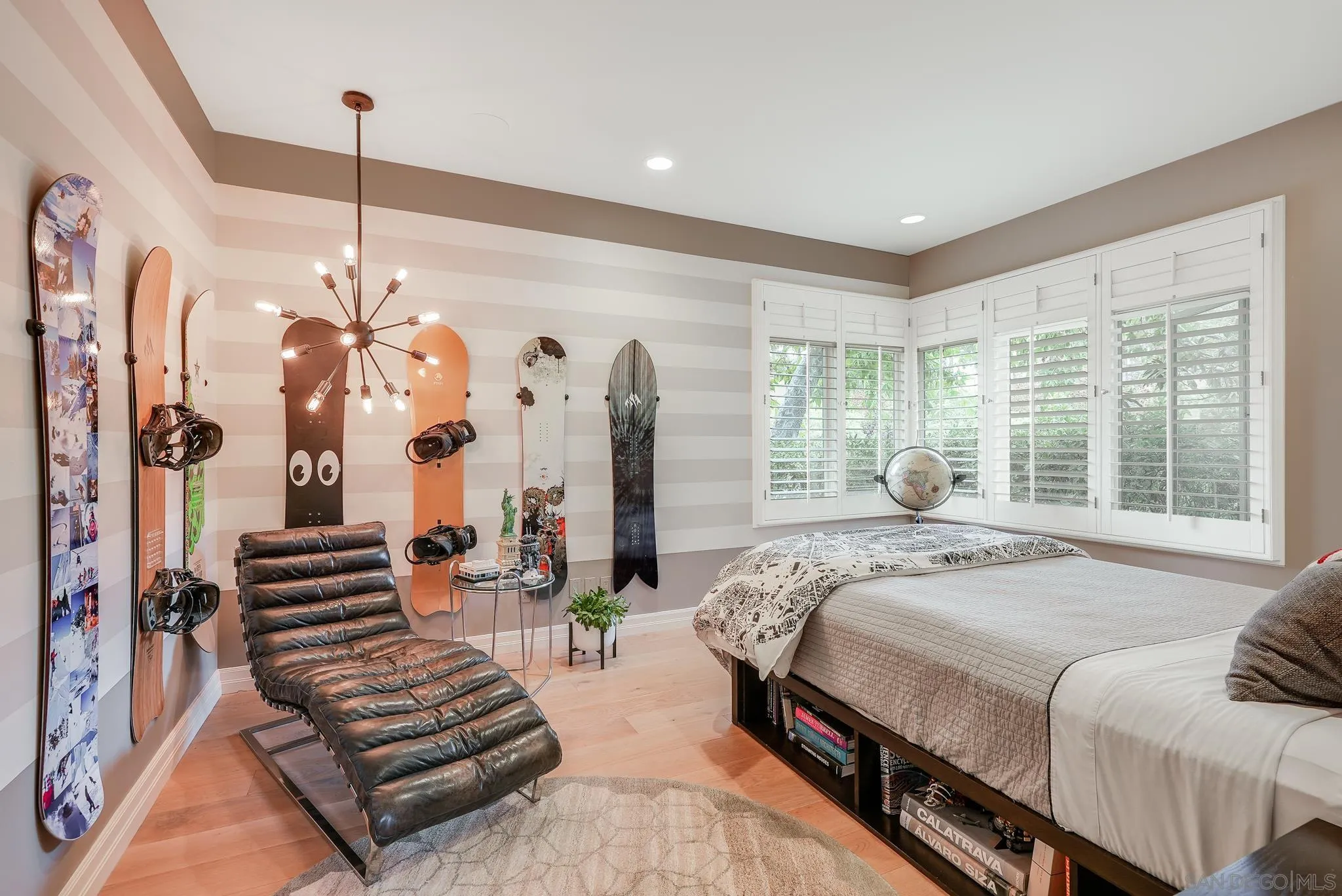 7891 Muirfield Way Rancho Santa Fe, CA 92067 - Photo 37 of 47 a bedroom with bed and a chandelier