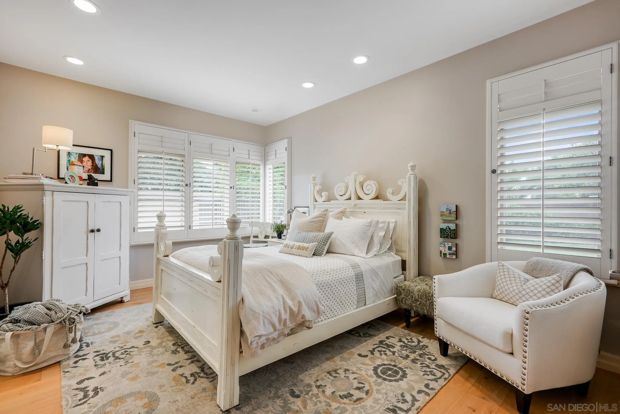 7891 Muirfield Way Rancho Santa Fe, CA 92067 - Photo 39 of 47 a bedroom with a bed and a couch