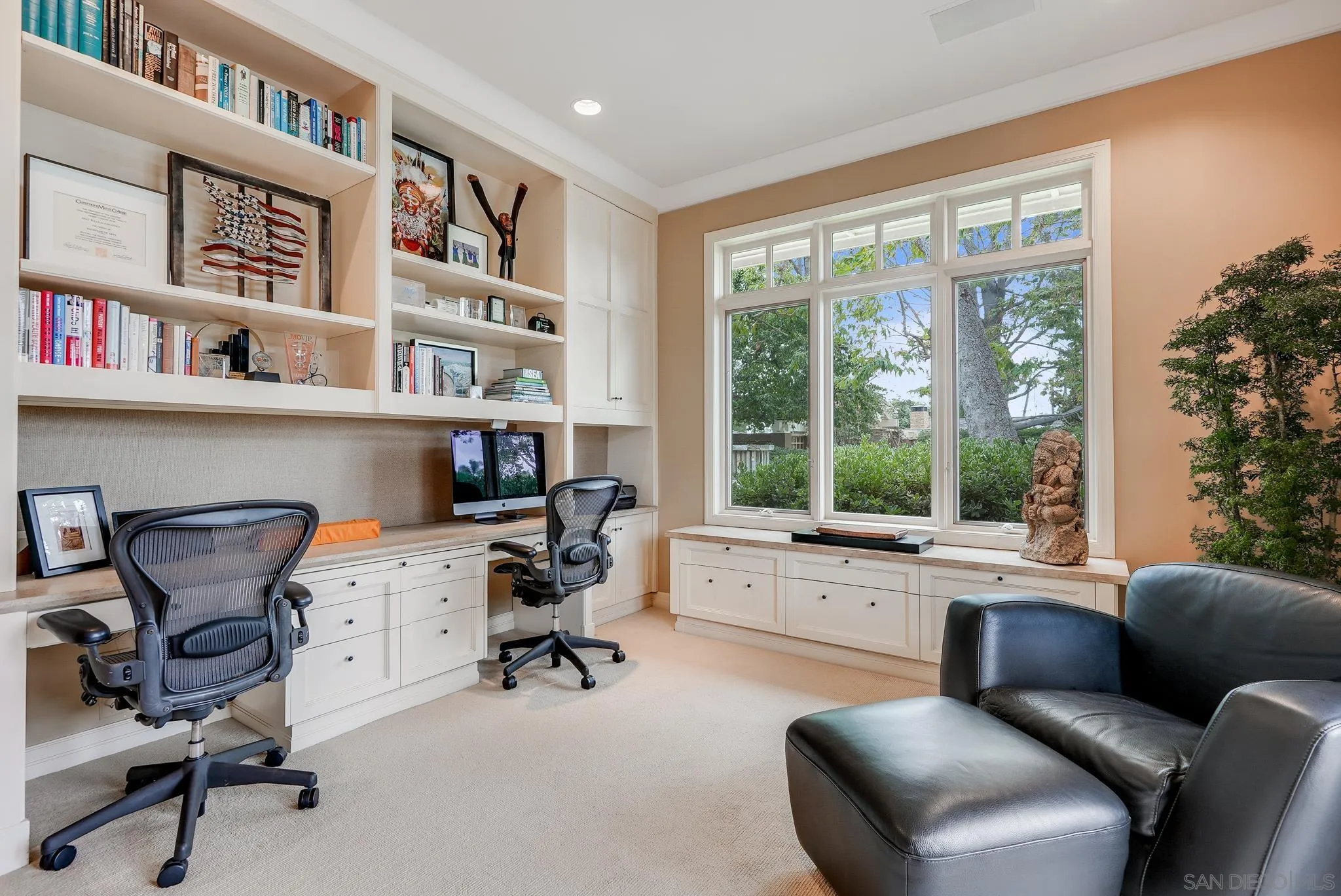 7891 Muirfield Way Rancho Santa Fe, CA 92067 - Photo 41 of 47 a view of a workspace with furniture and a window