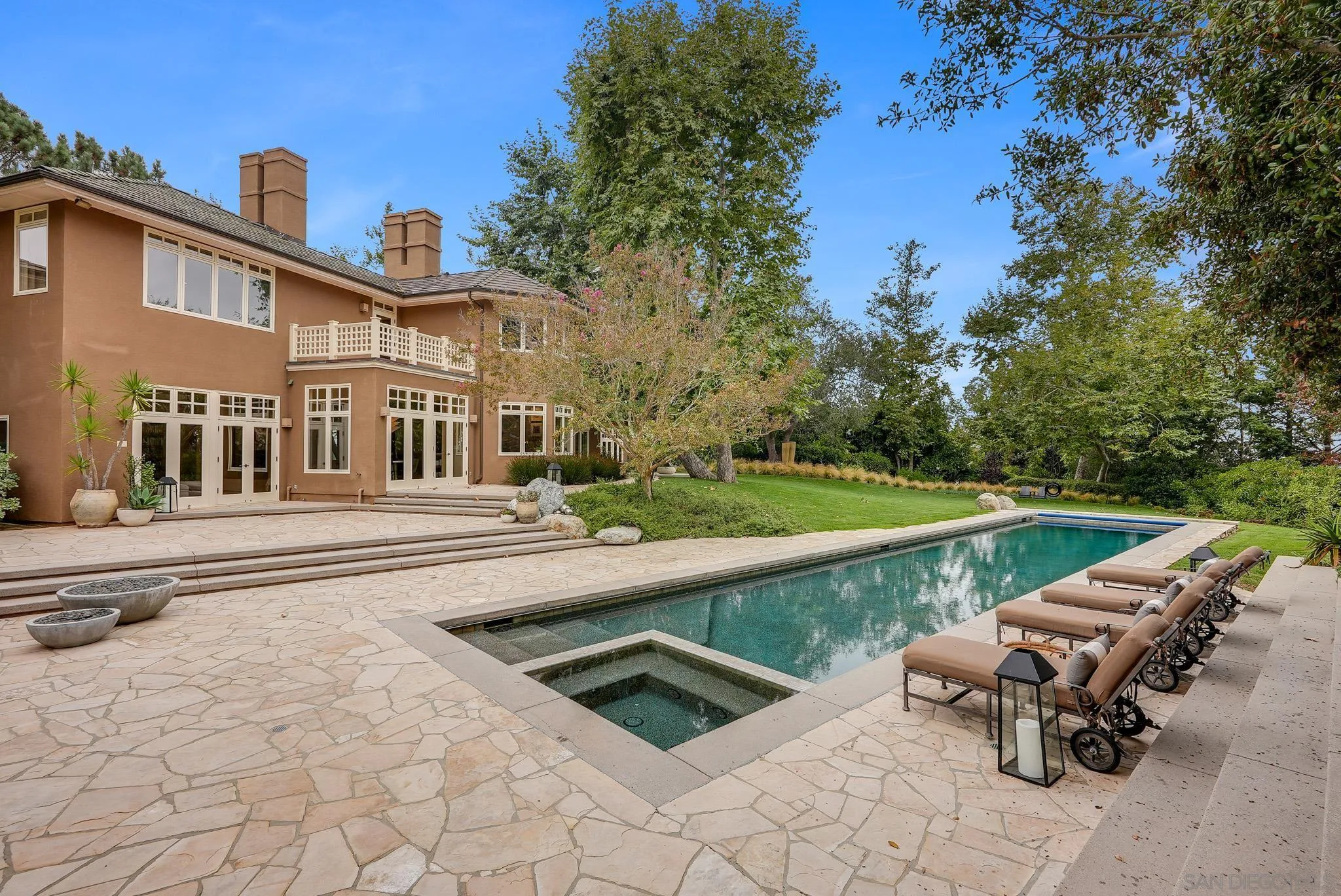7891 Muirfield Way Rancho Santa Fe, CA 92067 - Photo 5 of 47 a view of swimming pool with lawn chairs and plants