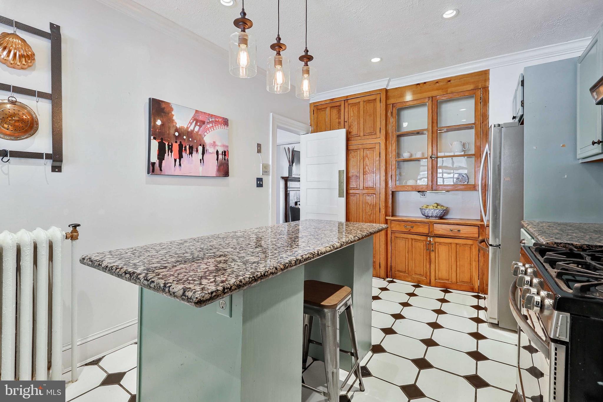 610 Somerset Road, Unit 301 Baltimore, MD 21210 - Photo 18 of 44 Kitchen featuring classic black & white tiling