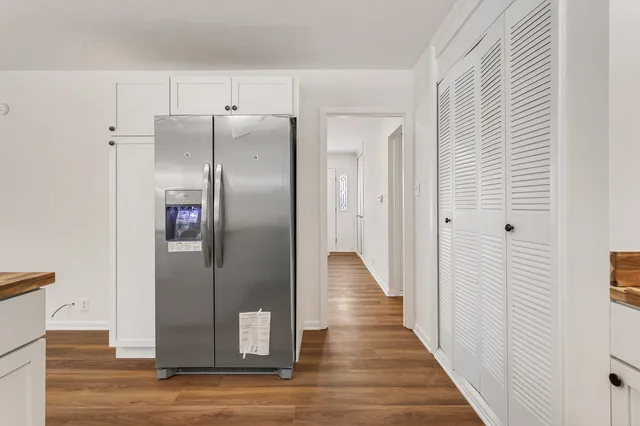 a view of cabinets a sink and dishwasher in a kitchen