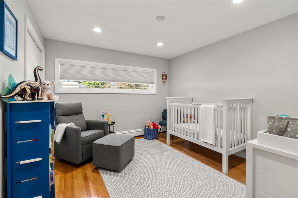 28 Woodbine Circle Needham, MA 02494 - Photo 17 of 29 a living room with furniture and a window