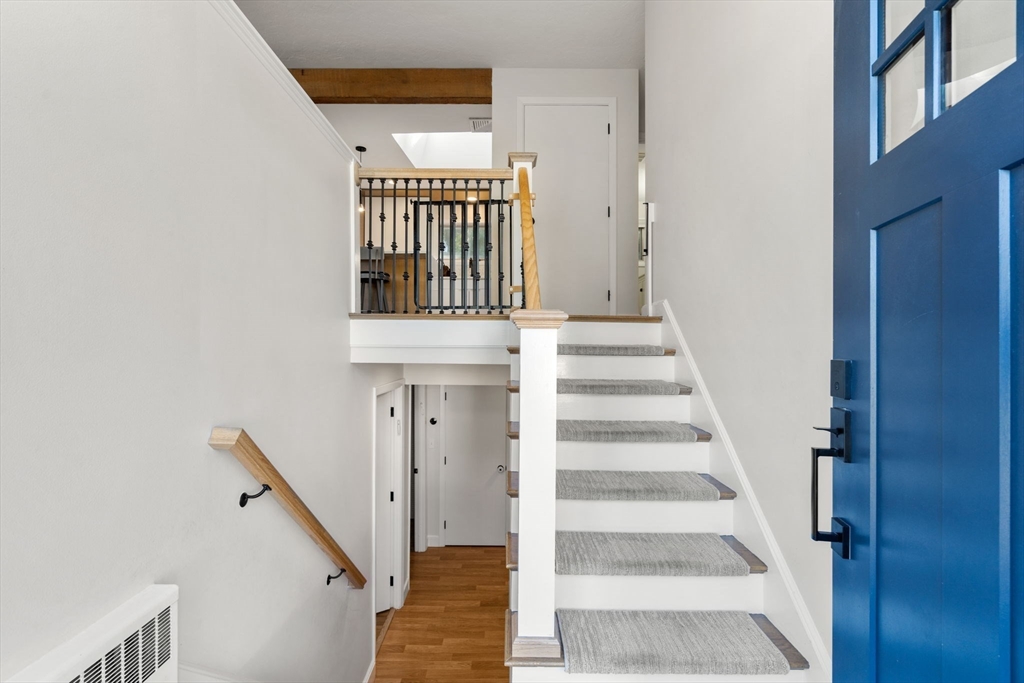 28 Woodbine Circle Needham, MA 02494 - Photo 19 of 29 a view of entryway with wooden floor and a front door