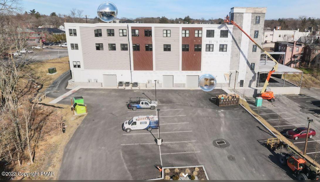 55 North Courtland Street, Unit 204 East Stroudsburg, PA 18301 - Photo 7 of 7 a view of roof with sitting area