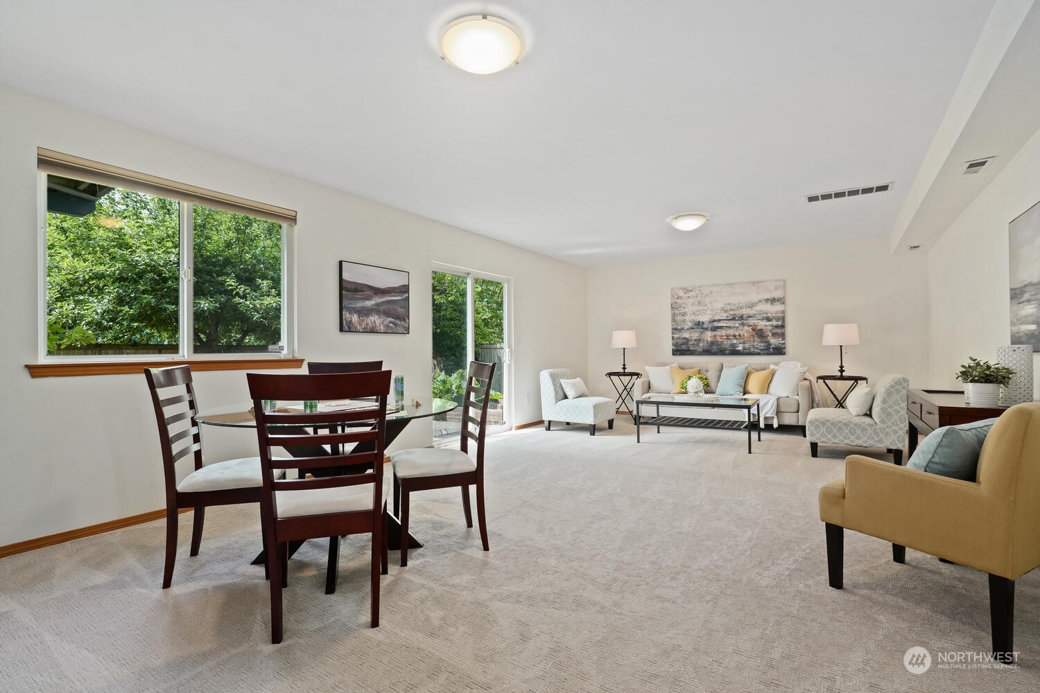 1326 238th Place Southwest Bothell, WA 98021 - Photo 25 of 34 a living room with furniture and a large window