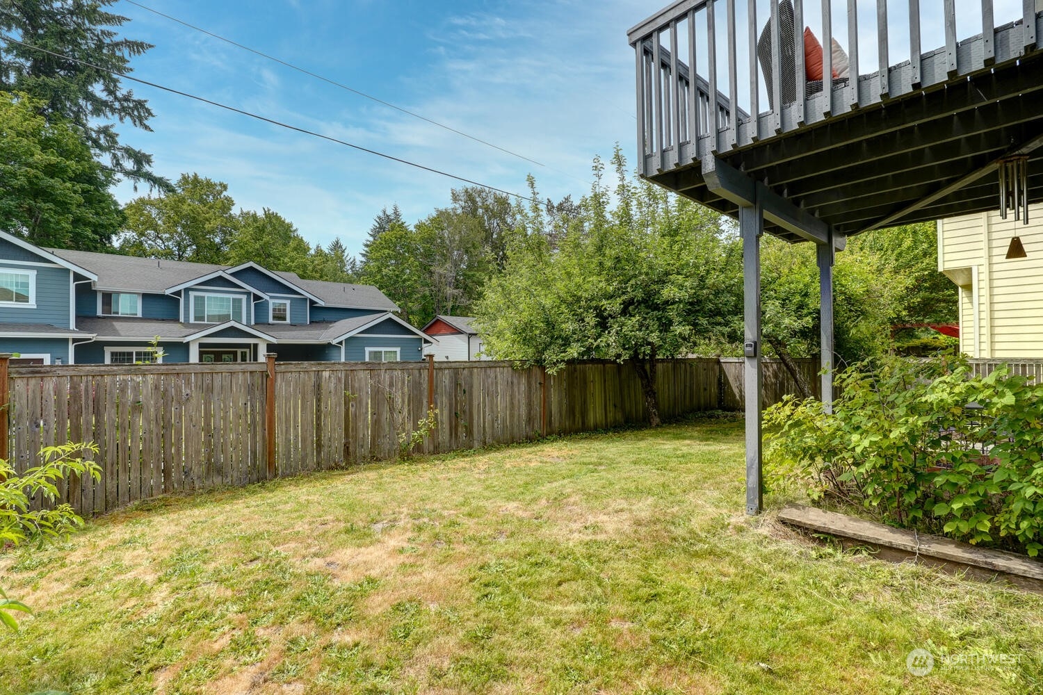 1326 238th Place Southwest Bothell, WA 98021 - Photo 34 of 34 a front view of a house with a yard