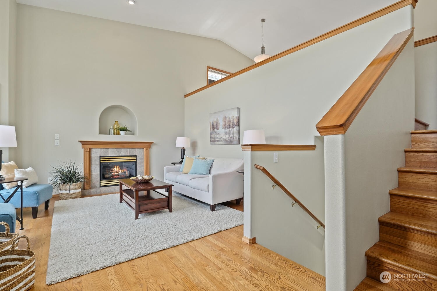 1326 238th Place Southwest Bothell, WA 98021 - Photo 5 of 34 a living room with furniture and a fireplace