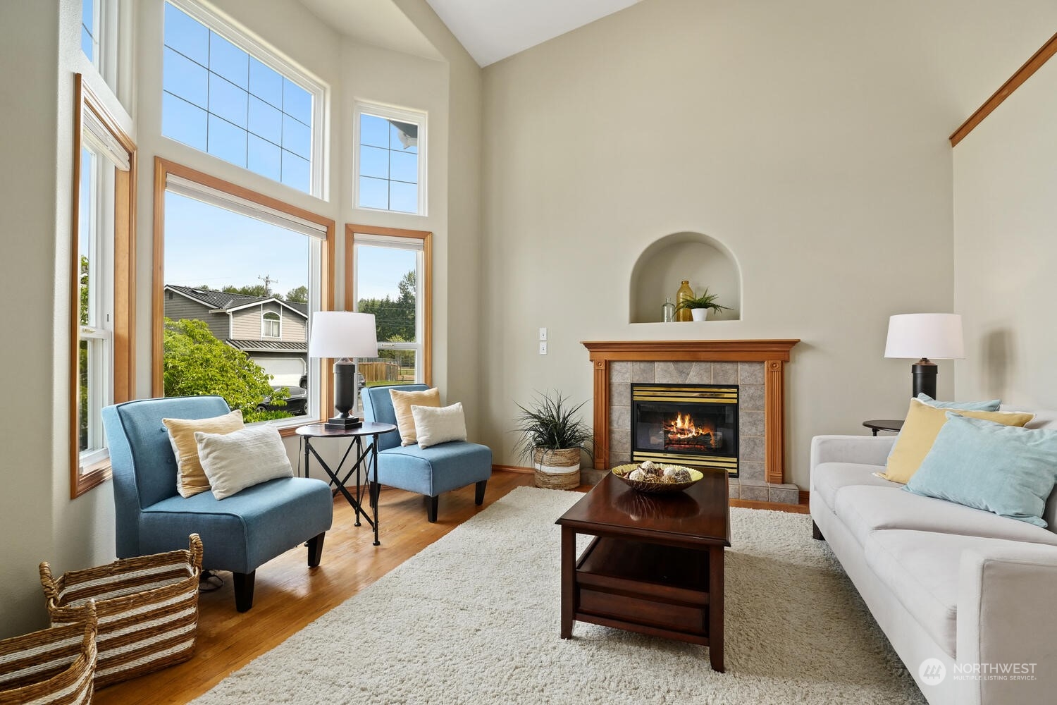 1326 238th Place Southwest Bothell, WA 98021 - Photo 6 of 34 a living room with furniture and a fireplace