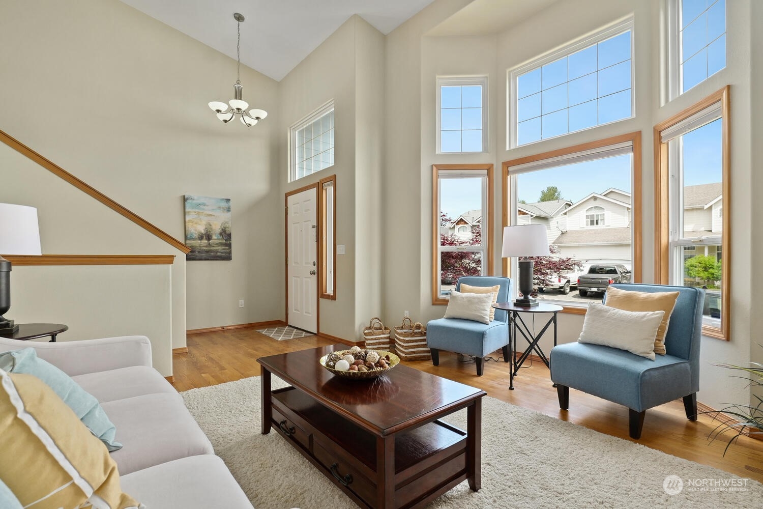 1326 238th Place Southwest Bothell, WA 98021 - Photo 8 of 34 a living room with furniture and a large window