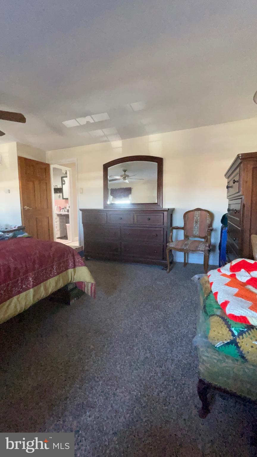 12663 Dunks Ferry Road Philadelphia, PA 19154 - Photo 11 of 22 a bedroom with a bed and dresser